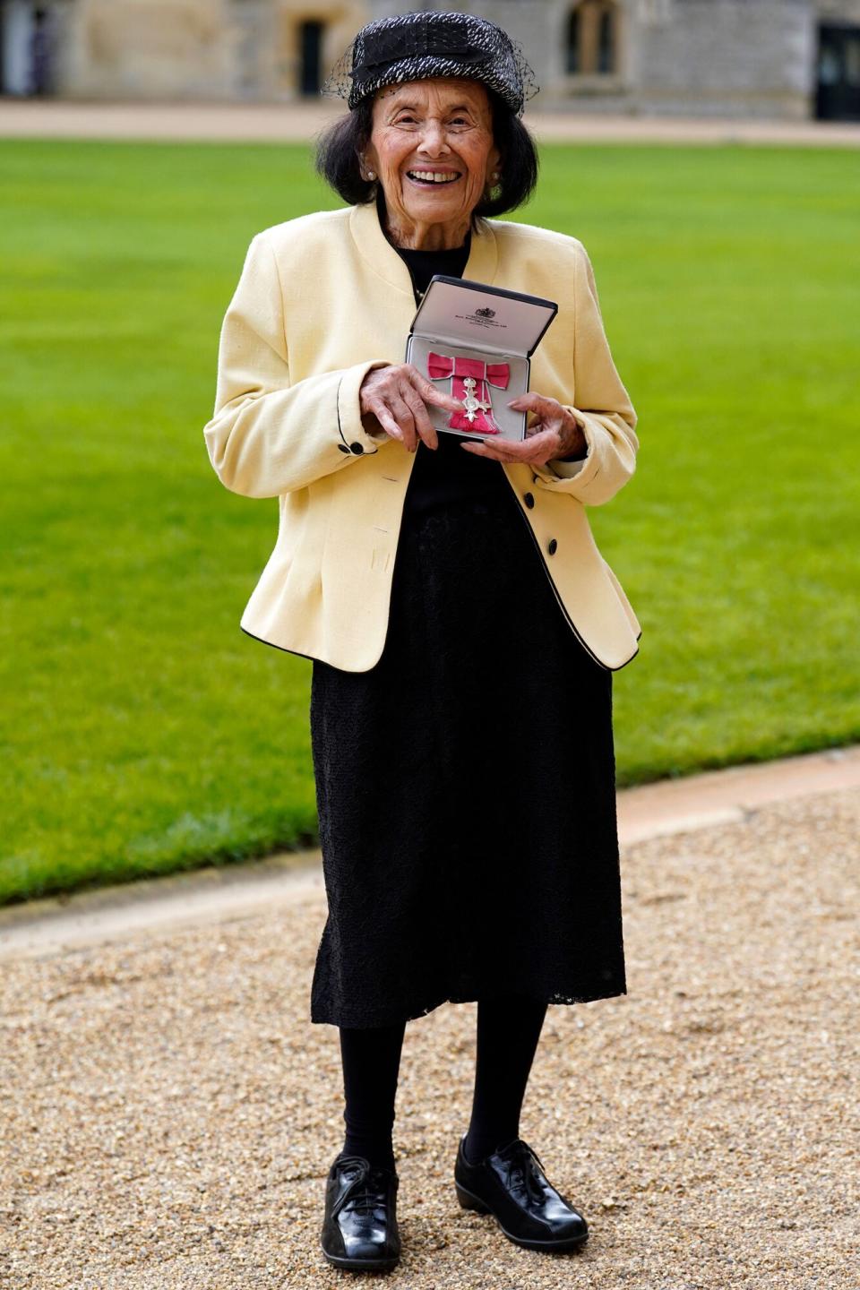 Hungarian-born Holocaust survivor Lily Ebert poses with her medal after being appointed a Member of the Order of the British Empire (MBE) following an investiture ceremony at Windsor Castle, on January 31, 2023.