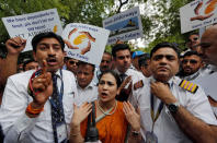 Jet Airways employees and their family members attend a protest demanding to "save Jet Airways" in New Delhi, India, April 18, 2019. REUTERS/Adnan Abidi