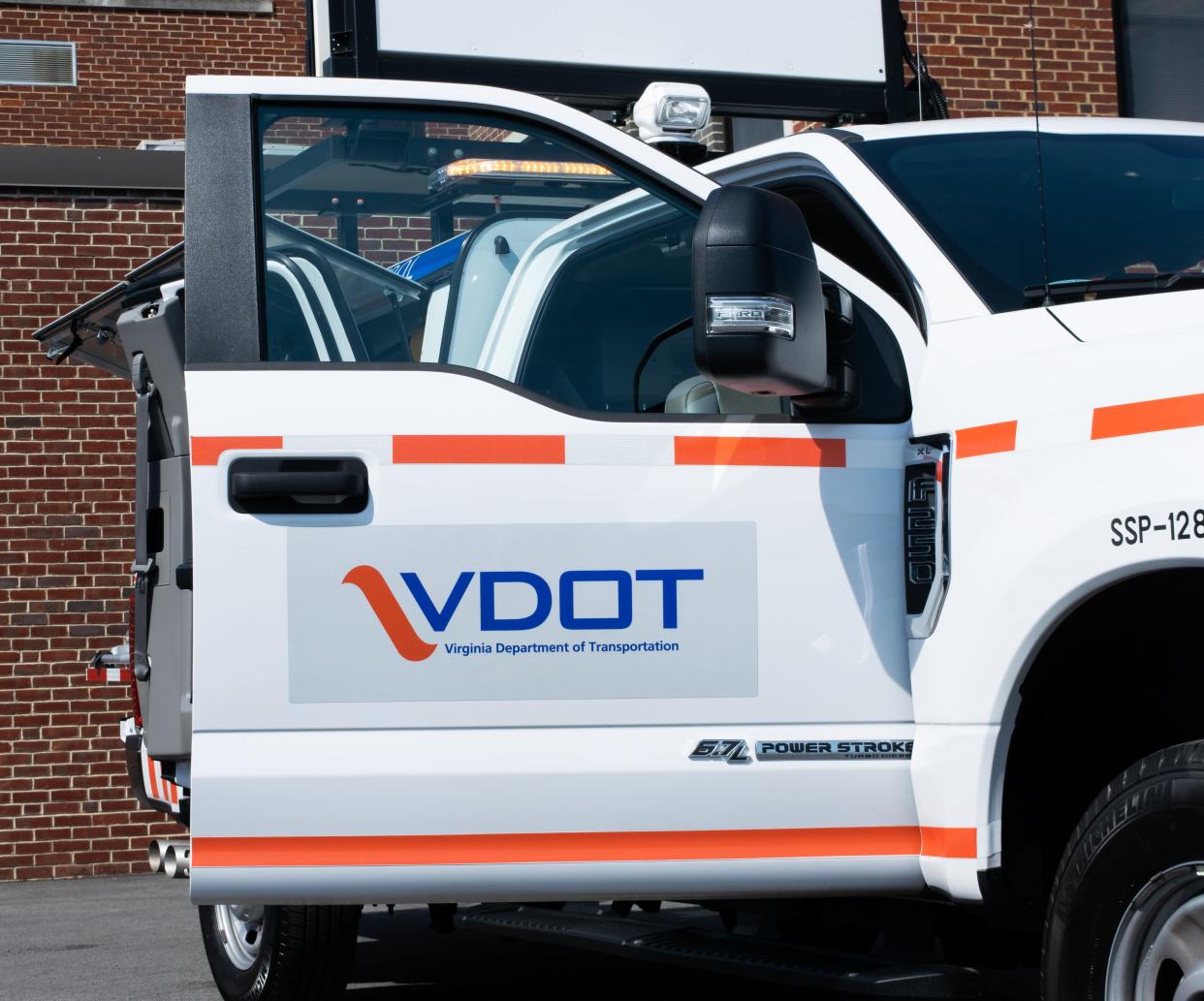 A Virginia Department of Transportation safety service patrol truck at the department's Staunton District office. SSP trucks are white with orange trim and blue lettering.