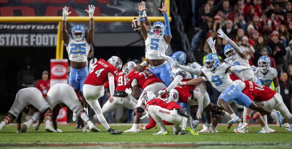 N.C. Stater kicker Brayden Naverson (44) connects for a 40-yard field goal to give the Wolfpack a 6-0 lead over North Carolina in the fist quarter on Saturday, November 25, 2023 at Carter-Finley Stadium in Raleigh, N.C.