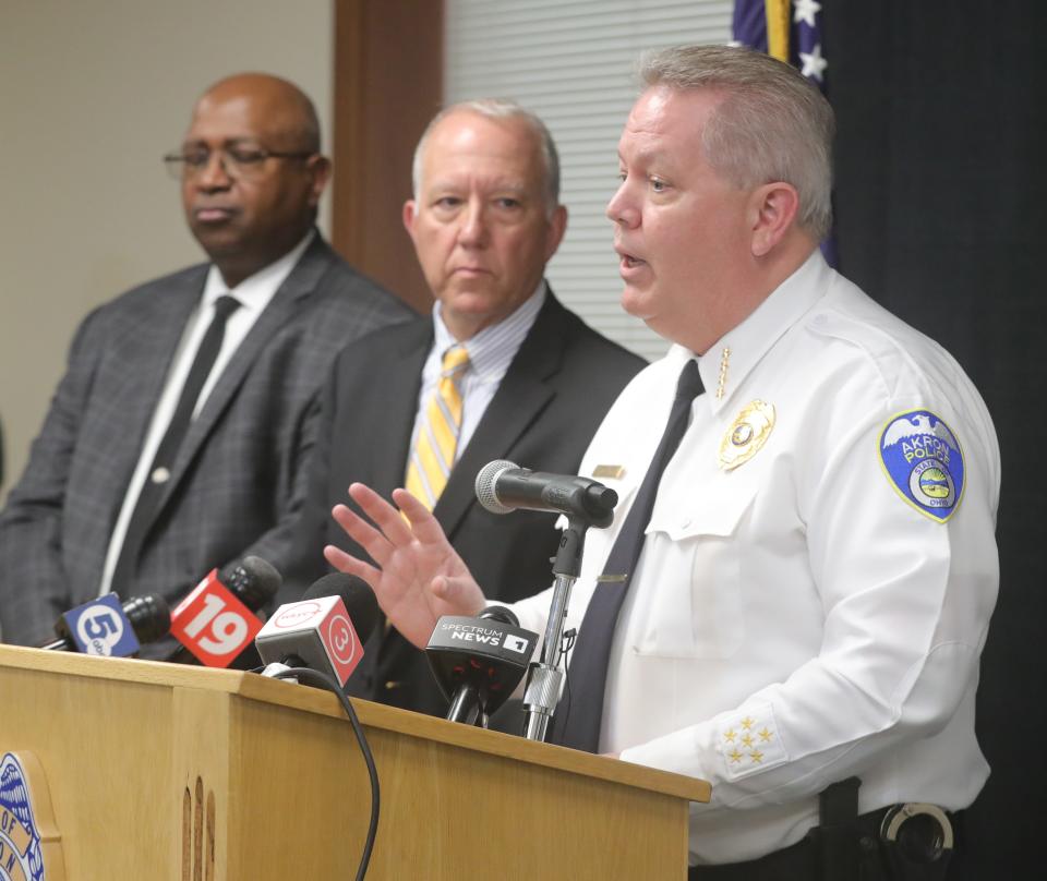 Clarence Tucker, from left, Akron deputy mayor for public safety, and Mayor Dan Horrigan stand with Police Chief Steve Mylett during a press conference Monday after the grand jury's decision in the fatal shooting of Jayland Walker.