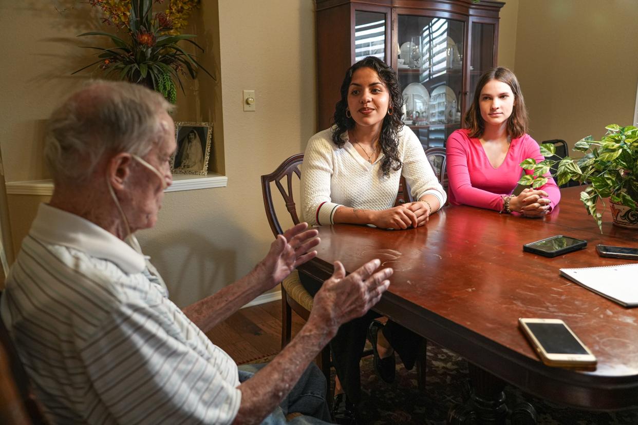 From right, University of Texas students Galilea Dupree and Paula Somoza interview Bob Bell. In her nursing classes, Dupree said, "it's completely patient care, pathophysiology, what's wrong with the body and how can we fix it. ... I was really craving some kind of experience that would allow me to connect on a much deeper level."