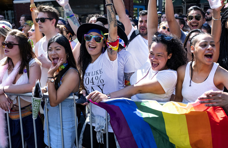 Spectators cheer participants during the LBGTQ Pride march Sunday, June 30, 2019, in New York. (AP Photo/Craig Ruttle)
