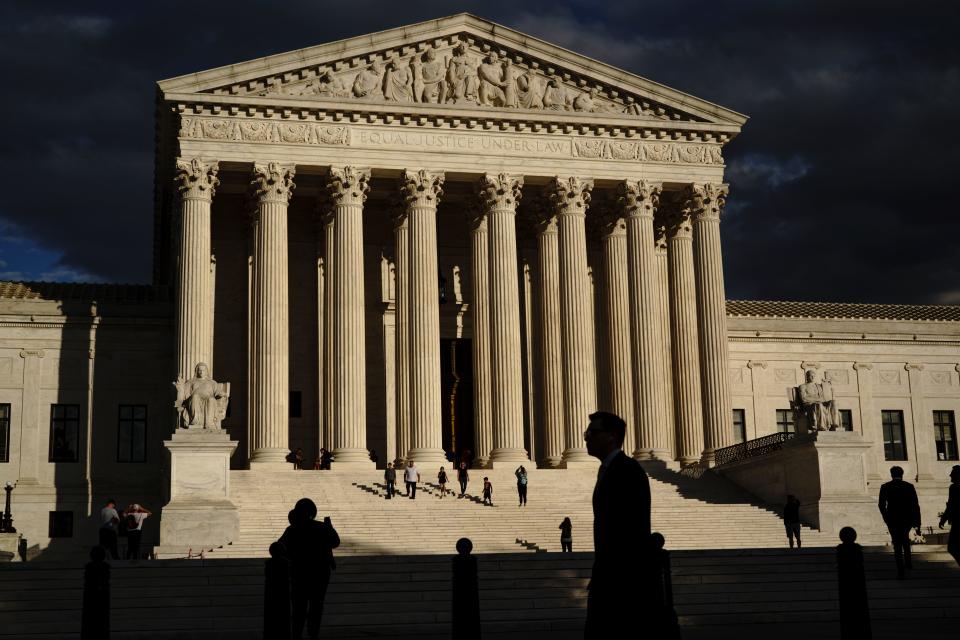The U.S Supreme Court building is seen at dusk in Washington on Oct. 22, 2021.