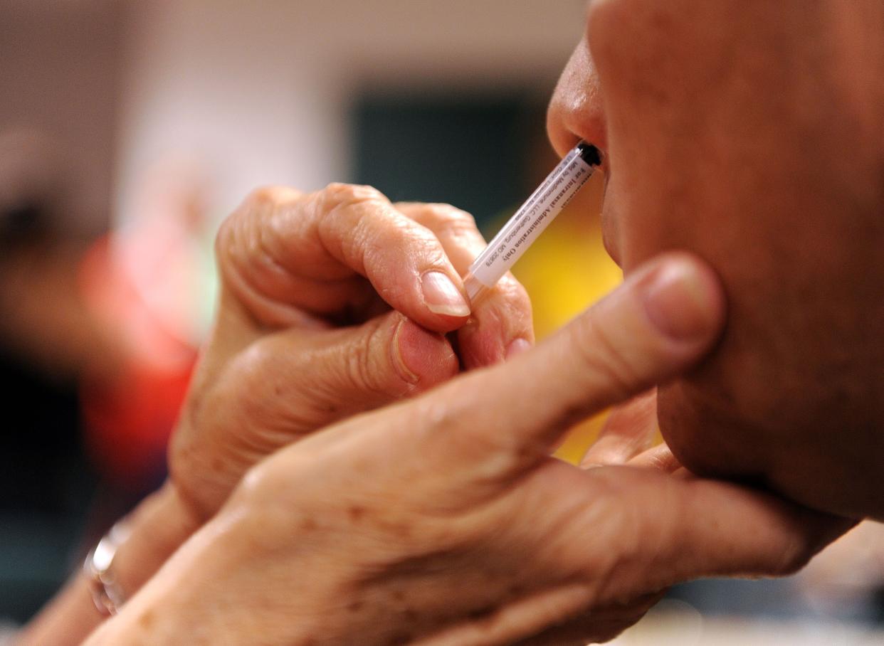 An undisclosed nasal vaccine is distributed to a patient.  