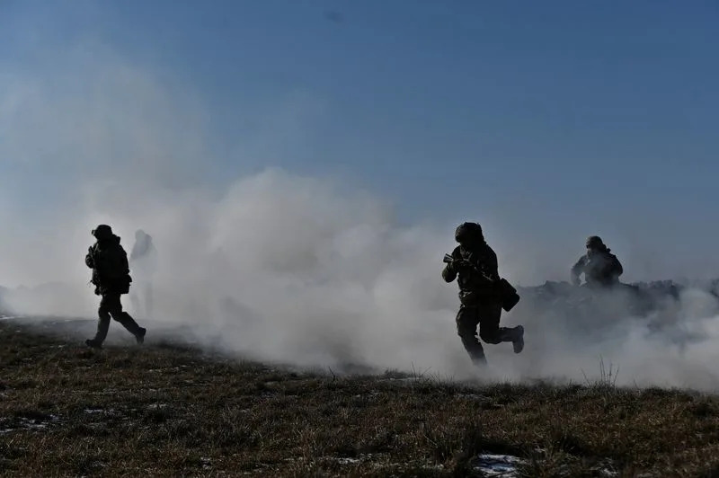 Ukrainian service members attend military exercises in Zaporizhzhia region