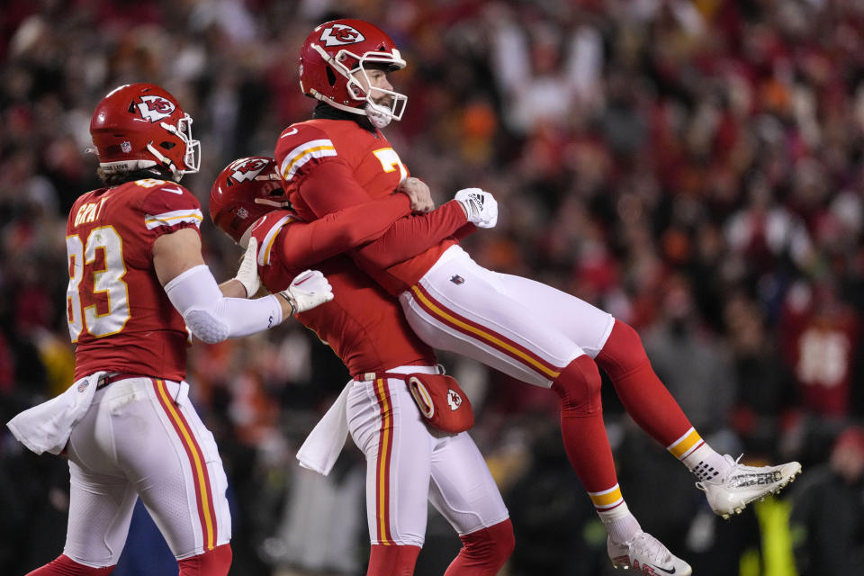 Kansas City Chiefs place kicker Harrison Butker (7) is lifted in the air after his game-winning field goal against the Cincinnati Bengals during the second half of the NFL AFC Championship playoff football game, Sunday, Jan. 29, 2023, in Kansas City, Mo. The Chiefs won 23-20. (AP Photo/Jeff Roberson)