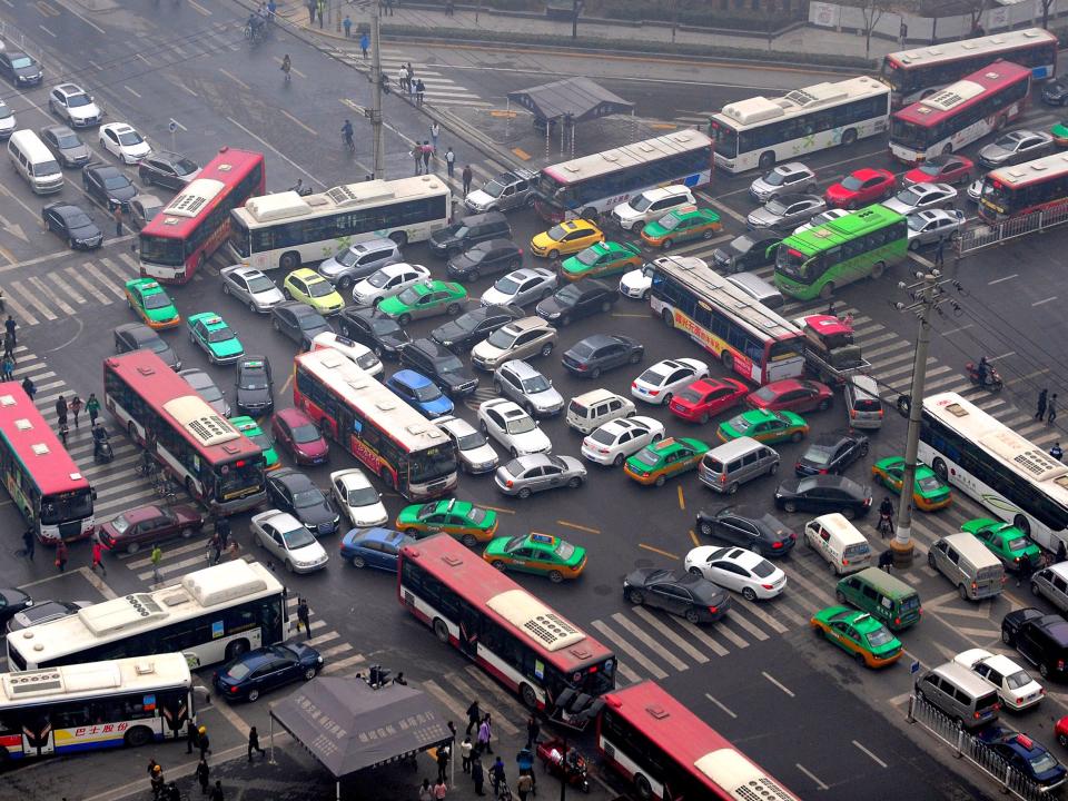 traffic jam intersection cars buses crossroads china