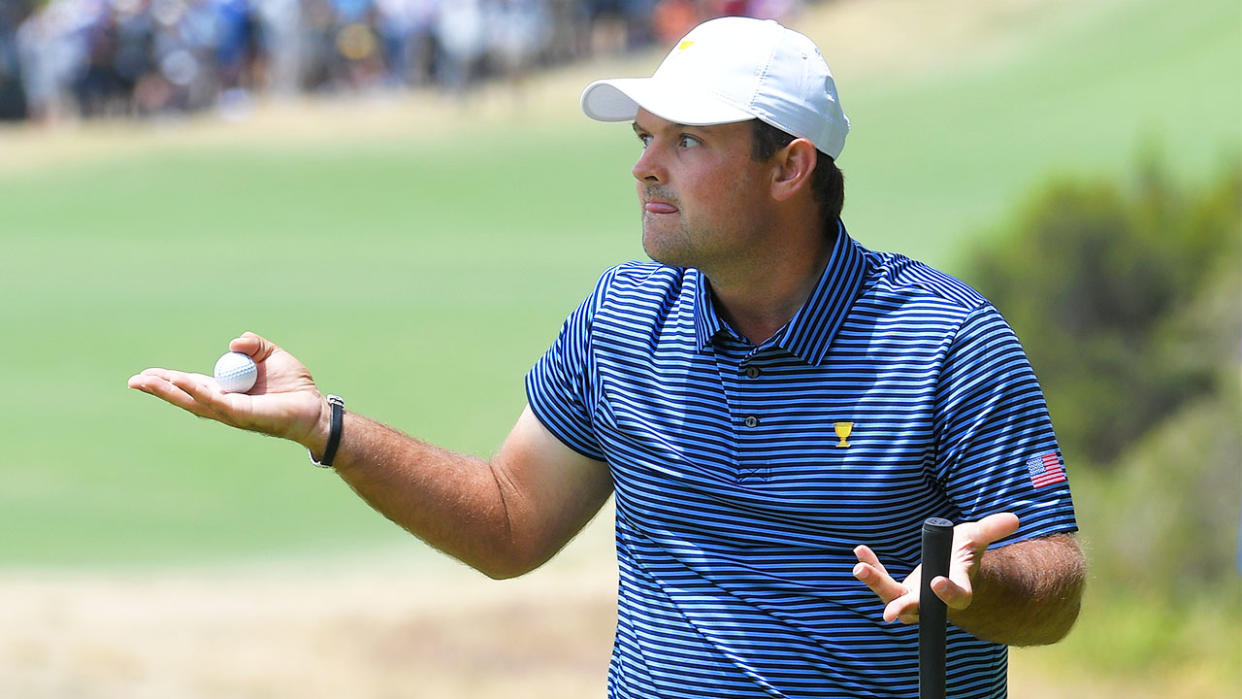 Patrick Reed of the United States team provokes the gallery after making his putt on the 11th green during the second round foursome matches of the Presidents Cup at The Royal Melbourne Golf Club on December 13, 2019, in Victoria , Australia. (Photo by Stan Badz/PGA TOUR via Getty Images)