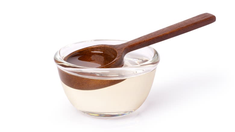 Syrup in bowl with spoon