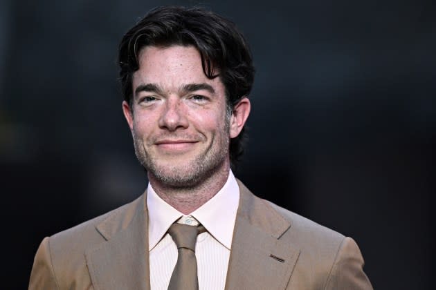 John Mulaney poses on the red carpet as he arrives for 'The Prelude to the Olympics' at The Fondation Louis Vuitton in Paris  ahead of the 2024 Paris Olympics  - Credit: Julien de Rosa/AFP/Getty Images