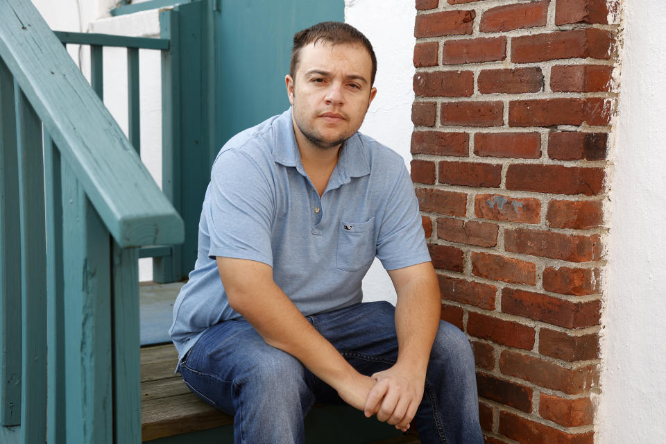 Mike Bouboulis sits for a portrait in Arlington, Mass., on Wednesday, Sept. 13, 2023. Bouboulis has taken Saxenda, Mounjaro or Ozempic, a Novo diabetes drug with the same active ingredient as Wegovy, since around 2019. In the past year after their popularity exploded, refilling a prescription involved calling five to seven pharmacies. “They all know what you’re calling for, and they all have the same answer: ‘I don’t know. We’ll see tomorrow,’" said the 35-year-old small business owner. (AP Photo/Mary Schwalm)