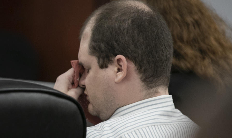 Tim Jones becomes emotional as a video is played in court showing his son, Nahtahn during the sentencing phase of his trial in Lexington, S.C., Thursday, June 6, 2019. Jones, was found guilty of killing his 5 young children in 2014. (Tracy Glantz/The State via AP, Pool)