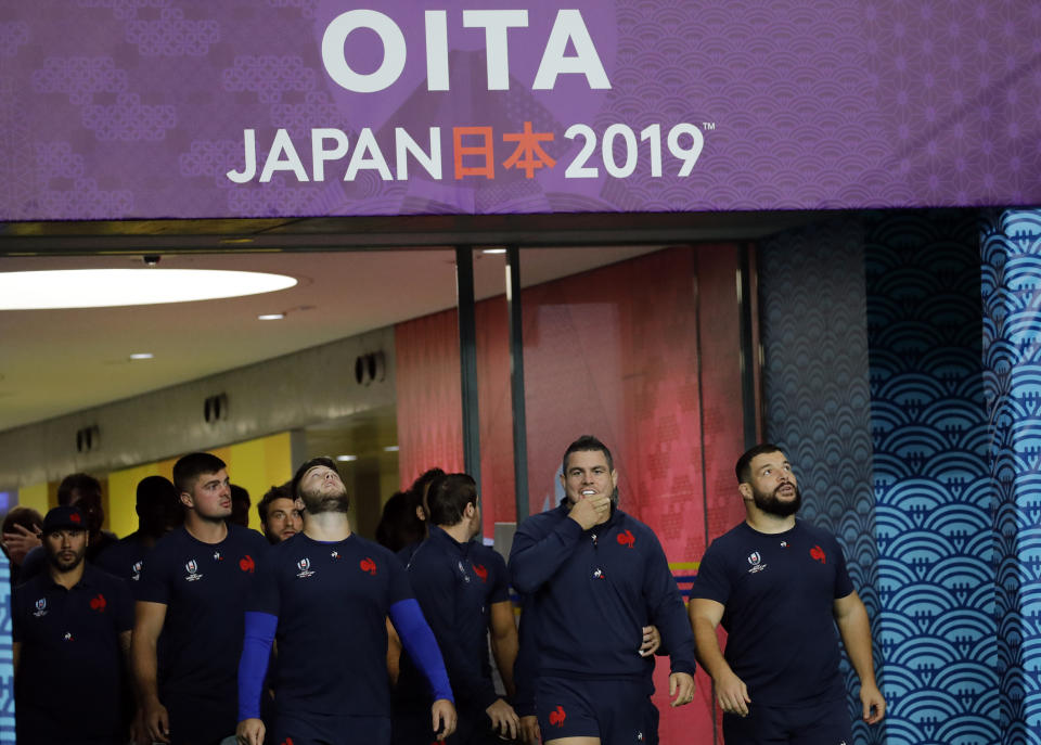 French rugby team players arrive for a training session in Oita, Japan, Friday Oct. 18, 2019. France will face Wales in the quarterfinals at the Rugby World Cup on Oct. 20.(AP Photo/Christophe Ena)