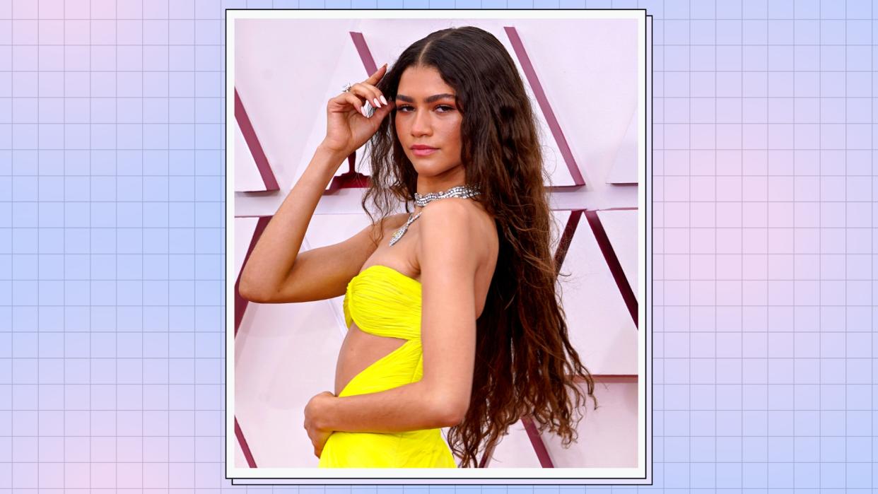  Zendaya pictured wearing a yellow dress with 'mermaid hair' waves as she attends the 93rd Annual Academy Awards at Union Station on April 25, 2021 in Los Angeles, California. / in a blue and purple template 