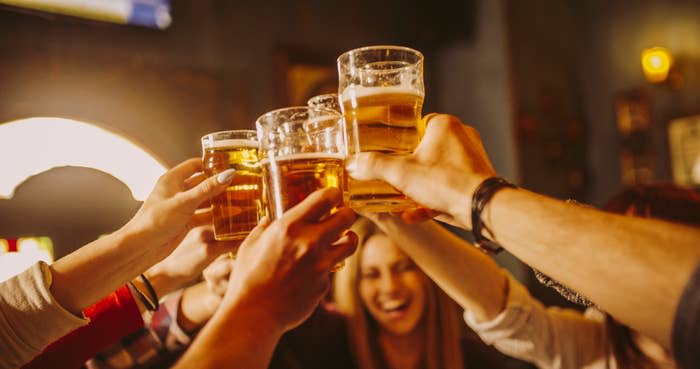 Friends raising glasses for a toast at a gathering