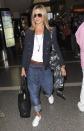 16. Jennifer Aniston -- in a sagging pair of fiance Justin Theroux's jeans -- exiting LAX (6/10/2012)