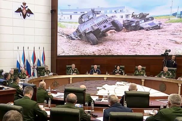 PHOTO: In this handout photo taken from video released by Russian Defense Ministry Press Service, Russian Defense Minister Sergei Shoigu, fourth left in the background, speaks during a meeting with high level officers in Moscow, Russia, May 24, 2023. (AP)