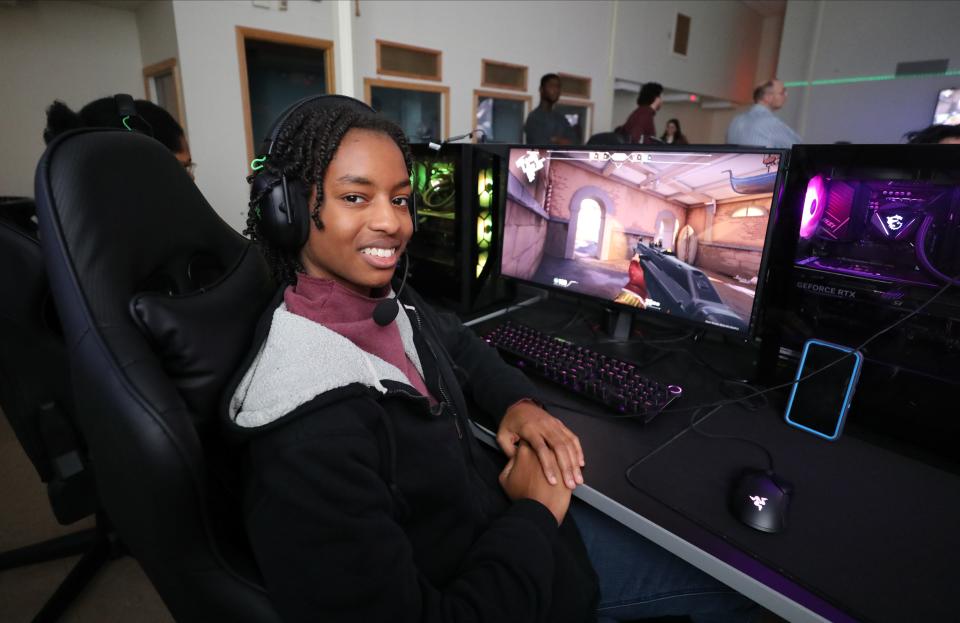 Zuri Jackson, a senior at the Mount Vernon STEAM Academy, takes a break as she practices her video game skills during an after school STEAM Knights E-Sports session at the school.