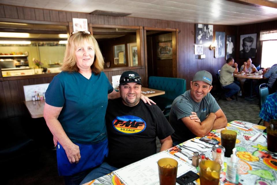 The Jack Ranch Cafe in Cholame is closing its doors on Aug. 28, 2022. Owner Chris Mize hugs customers on Aug. 25.