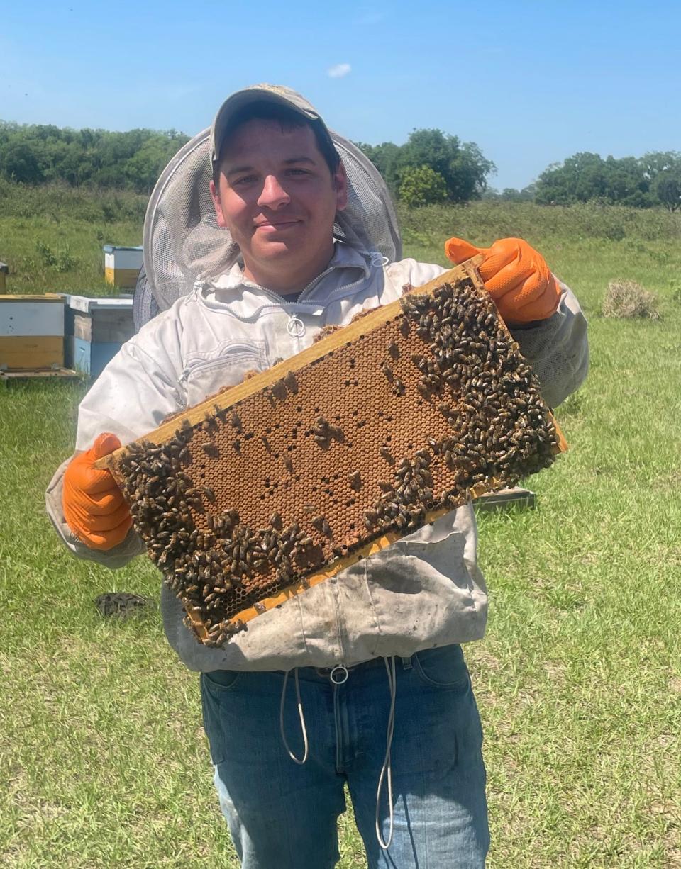 Walter Wilson III of Wilson's Honey, tending to the bees at Emery's Farm in the New Egypt section of Plumsted Township, to produce raw honey and honeycomb sold in the farm market.