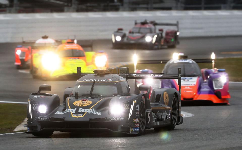 The no. 5 Cadillac leads a pack of DPi's through the bus stop, Saturday January 22, 2022 during Weather Tech Championship qualifying at Daytona International Speedway.