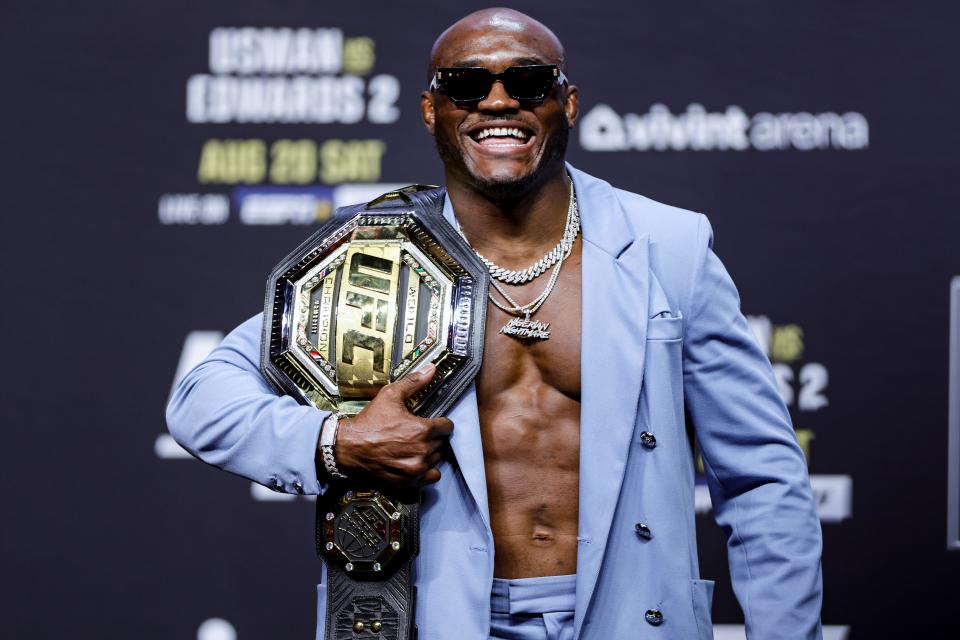 UFC welterweight champion Kamaru Usman is seen on stage during the UFC 276 ceremonial weigh-in at T-Mobile Arena on July 01, 2022, in Las Vegas, Nevada.