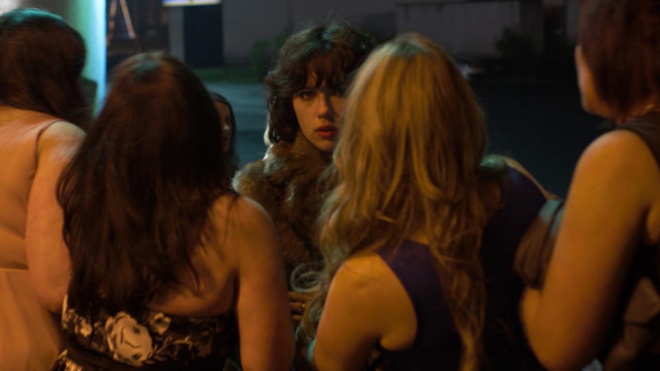 Scarlett Johansson is surrounded by women in Under the Skin