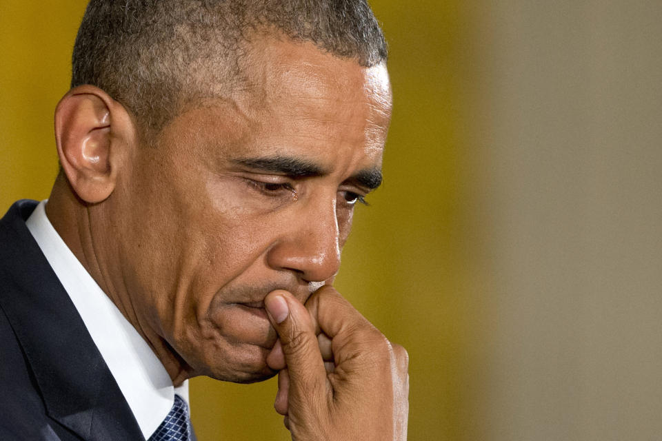 An emotional President Barack Obama pauses as he speaks about the youngest victims of the Sandy Hook shootings, Jan. 5, 2016, in the East Room of the White House in Washington, where he spoke about steps his administration is taking to reduce gun violence. (Photo: Jacquelyn Martin/AP)