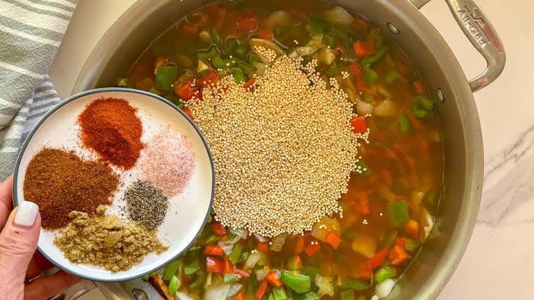 adding spices to pan