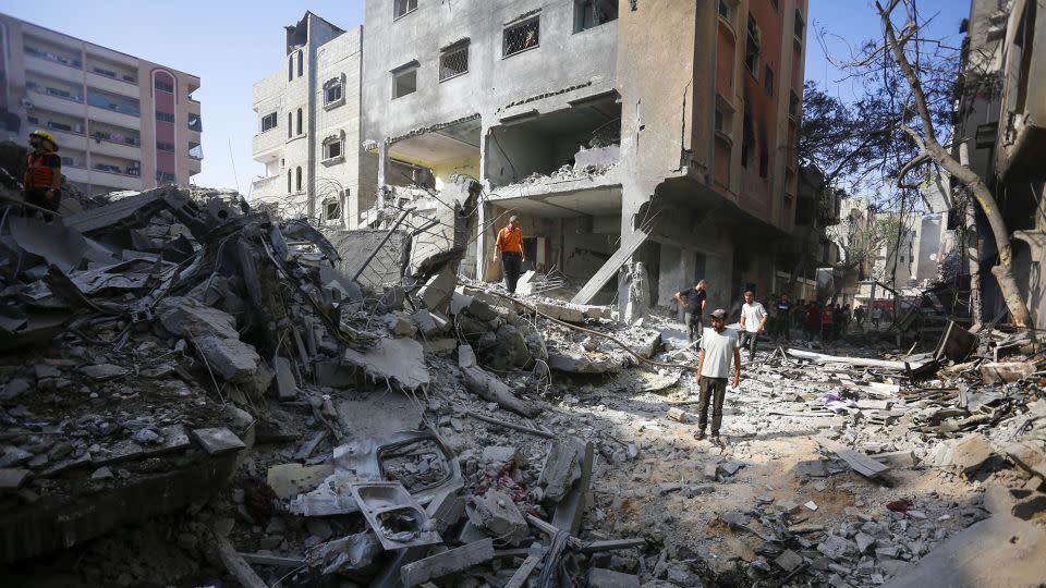 Civil defense teams and locals investigate the rubble after the Israeli operation in Nuseirat camp, Gaza, on June 8, 2024. - Ashraf Amra/Anadolu/Getty Images