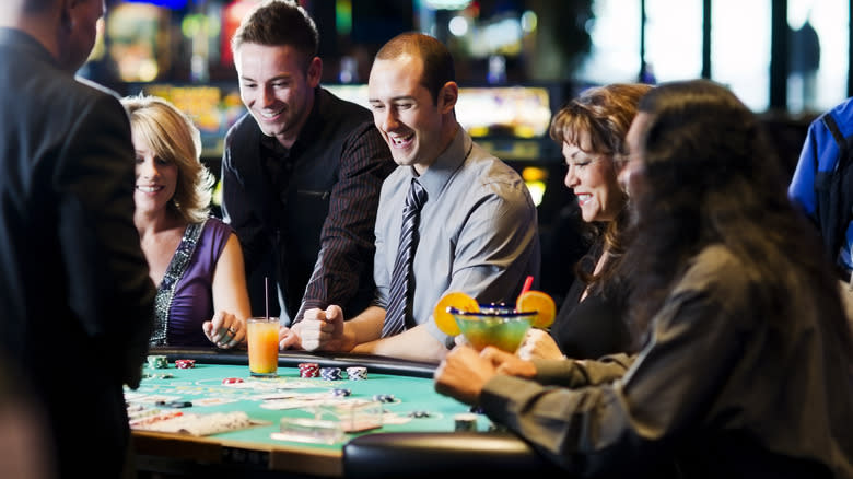 People enjoying cocktails at a casino