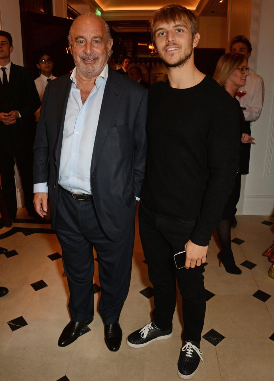 Sir Philip Green (L) and Brandon Green attend an event hosted by Naomi Campbell, Burberry and TASCHEN to celebrate the launch of 'Naomi'