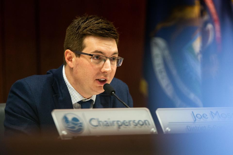 Ottawa County Board of Commissioners Chairperson Joe Moss speaks as members of the public approach the podium for comment Tuesday, Jan. 24, 2023.