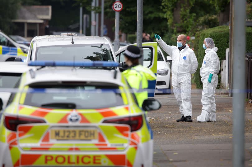 Police and forensics on Platt Lane in Fallowfield