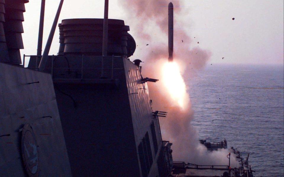 Arleigh Burke class destroyer USS Laboon, one of the warships now operating in the Red Sea, fires a missile on a previous occasion