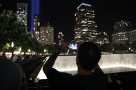 <p>The Tribute in Light rises above the New York skyline at the National September 11 Memorial & Museum on Sept. 11, 2017. (Gordon Donovan/Yahoo News) </p>