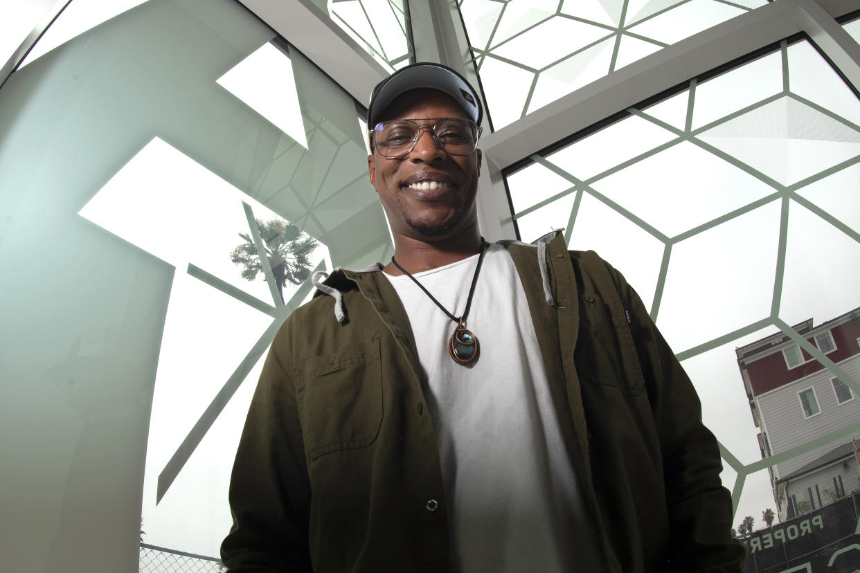 Nate Looney poses at the BAR Center at the Beach Thursday, June 16, 2022, in the Venice section of Los Angeles. Looney is a Black man who grew up in Los Angeles, a descendant of enslaved people from generations ago. He's also an observant, kippah-wearing Jew. (AP Photo/Mark J. Terrill)