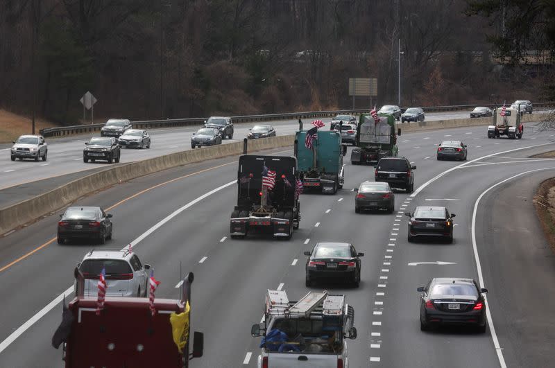 Truckers and their supporters make their way to drive around the Washington beltway