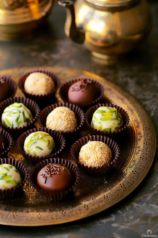 <p>Easy, homemade Halawa (Tahini Halva) made from scratch and revamped into the most elegant little truffles. Roll them in either pistachios, sesame seeds or dunk them in glorious chocolate.</p><p><strong>Get the recipe: <a href="/wp-admin/_wp_link_placeholder" data-ylk="slk:Halawa (Tahini Halva) Truffles;elm:context_link;itc:0;sec:content-canvas" class="link ">Halawa (Tahini Halva) Truffles</a></strong></p>