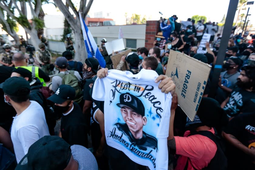 GARDENA, CALIFORNIA - JUNE 21: Hundreds of people rallied and marched outside the Compton Sheriffs' Office in protest for the shooting of Andres Guardado, security guard who was fatally shot by a Los Angeles County sheriff's deputy on Sunday, June 21, 2020 in Gardena, California. (Jason Armond / Los Angeles Times)