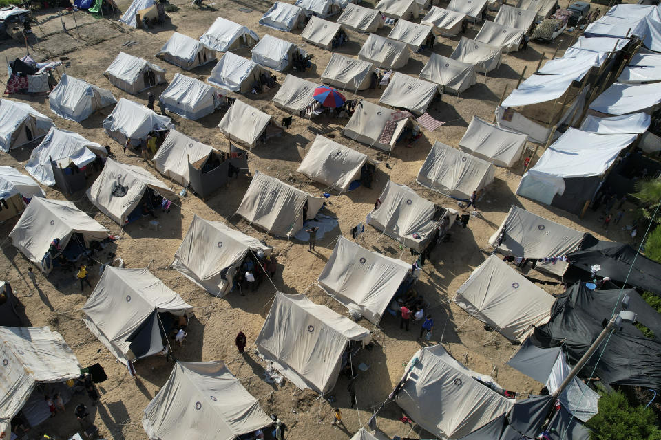 UNDP provided tens set up for Palestinians displaced by the Israeli bombardment of the Gaza Strip, are seen in Khan Younis on Thursday, Oct. 19, 2023. (AP Photo/Ashraf Amra)