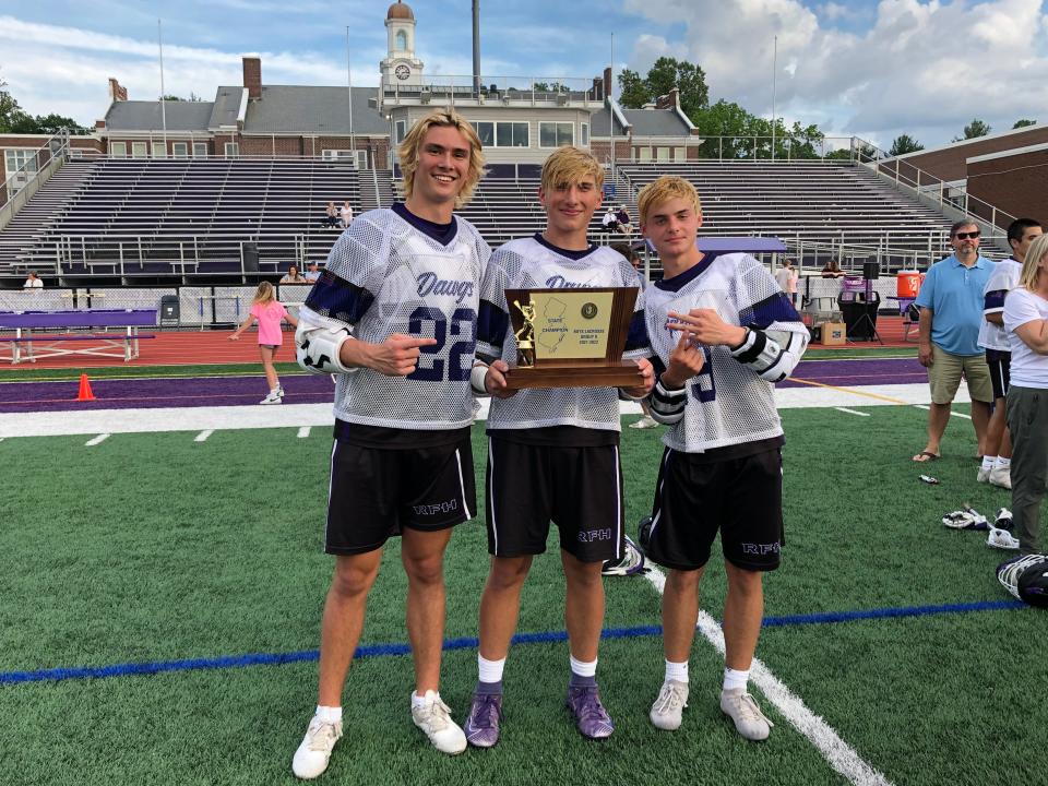 From left to right. Rumson-Fair Haven's Quinn Stankovits (#22), Tommy French (#14) and Cole Cashion (#19) celebrate after beating Summit, 9-5. Rumson-Fair Haven defeats Summit in the NJSIAA Group 2 State Final on June 3, 2022 at Rumson-Fair Haven Regional High School