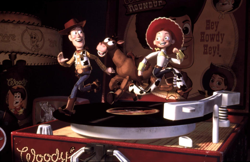 Woody, Bullseye, and Jessie the Cowgirl running on a record player