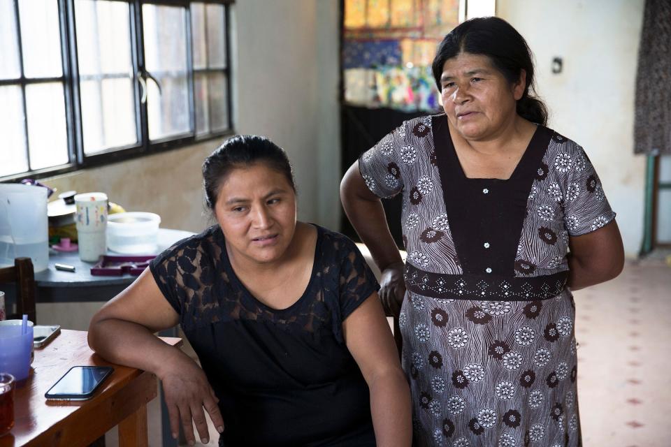Roberto Tecpile's wife, Verónica Montalvo, and his mother, Concepciona Acahua, put the money he sends from his job in Wisconsin into the home the family is building in Astacinga, México.