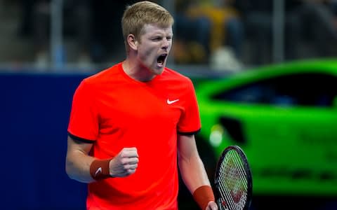 Britain's Kyle Edmund celebrates after winning his tennis match against France's Gael Monfils in the final of the 'European Open' hard court tennis tournament in Antwerp on October 21, 2018. - British number one Kyle Edmund fought back to down Gael Monfils in a final-set tie-break and claim his maiden ATP Tour title at the European Open in Antwerp. The 3-6, 7-6 (7/2), 7-6 (7/4) victory caps a breakthrough season for the 23-year-old and keeps alive his slim hopes of qualifying for the ATP World Tour Finals in London next month - Credit: AFP