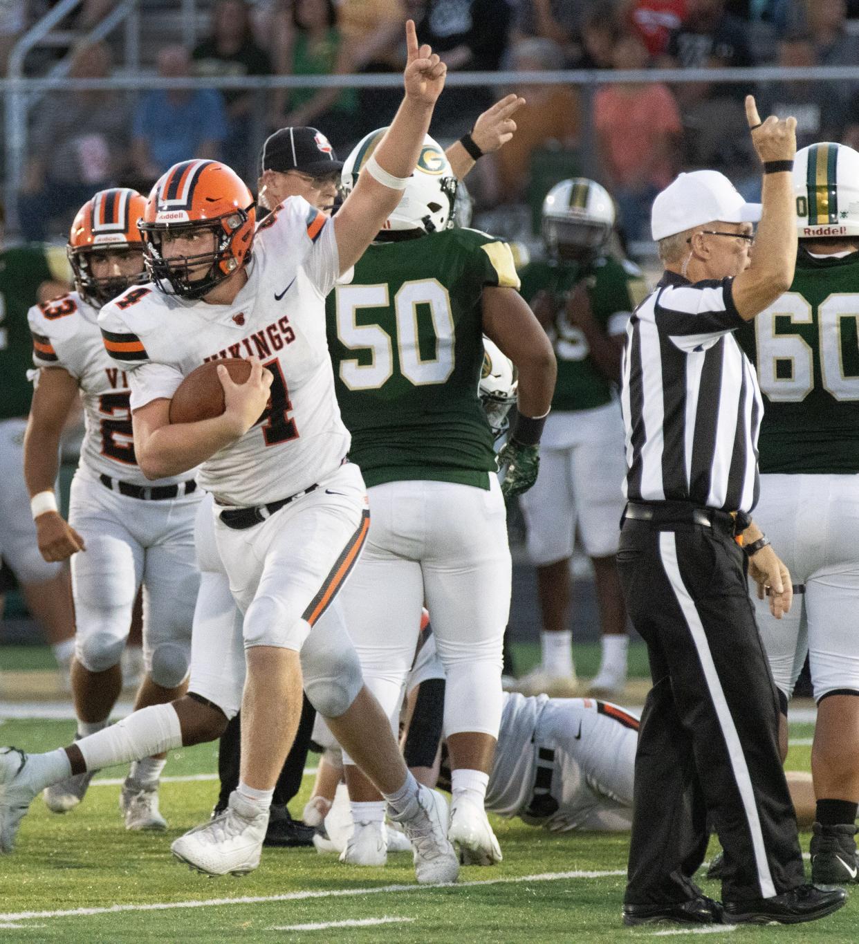 Hoover’s Drew Logan recovers a GlenOak fumble on Friday, Sept. 17, 2021.