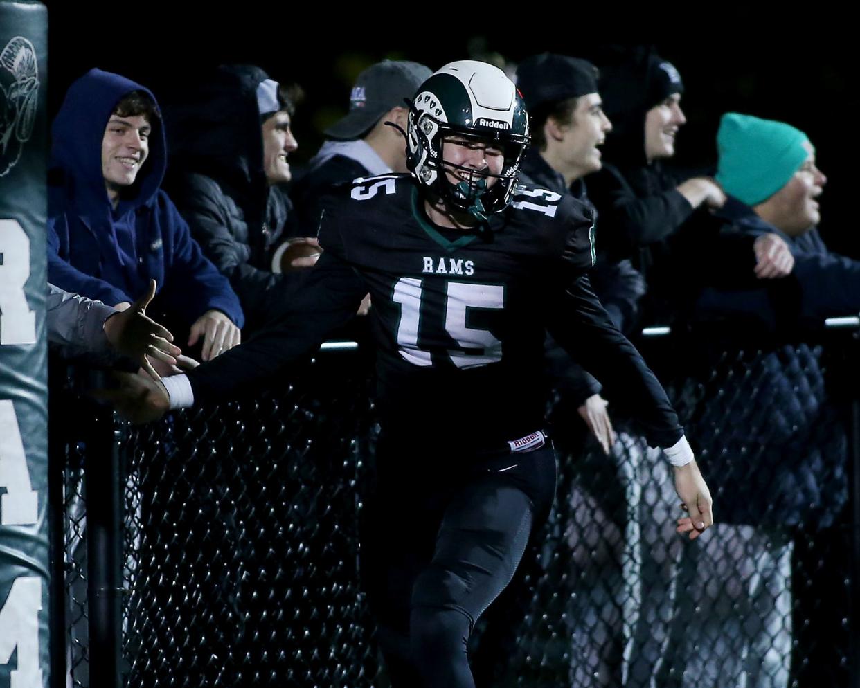Marshfield's Tor Maas is all smiles after celebrating his touchdown with classmates to give Marshfield the 28-13 over Plymouth North during third quarter action of their game in the Sweet 16 round of the Division 2 state tournament at Marshfield High on Friday, Nov. 3, 2023. Marshfield would go on to win 55-34.