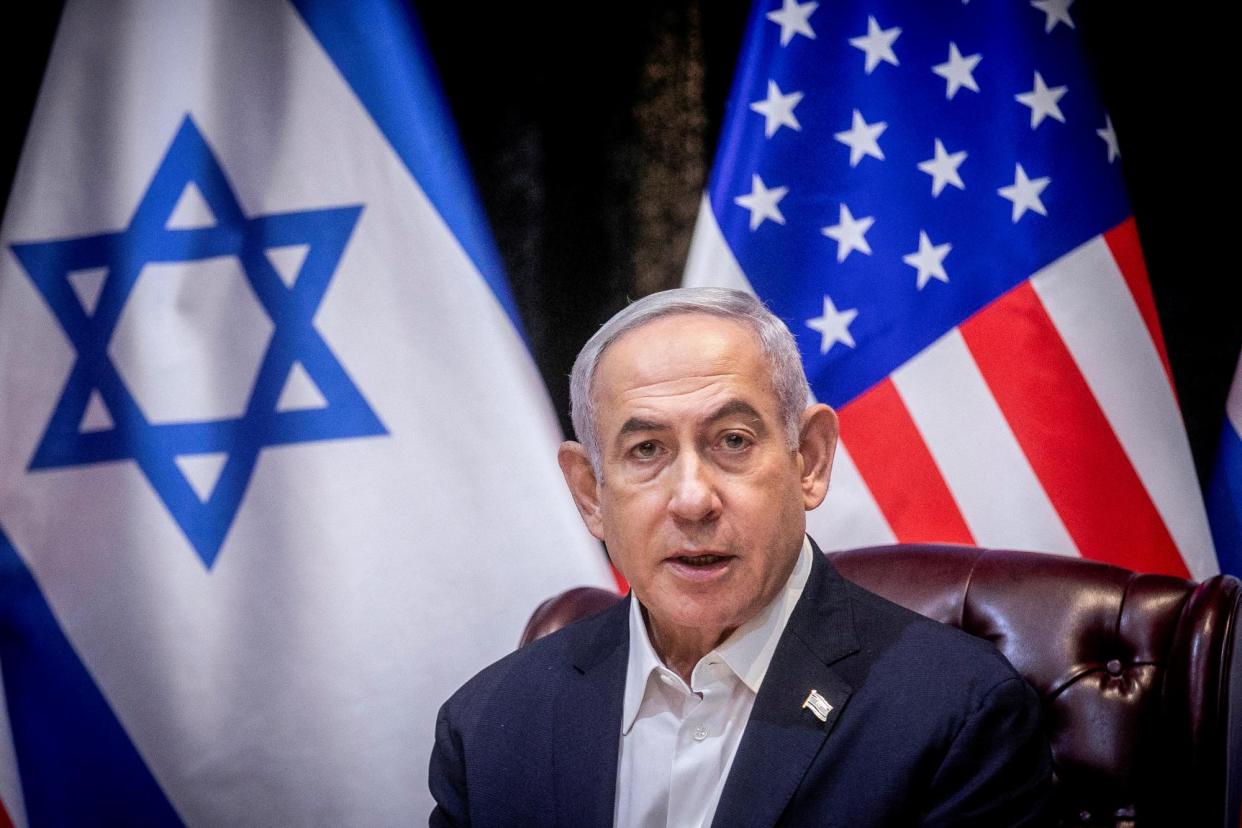 <span>Benjamin Netanyahu in Tel Aviv on 18 October 2023.</span><span>Photograph: Miriam Alster/Pool via Reuters</span>