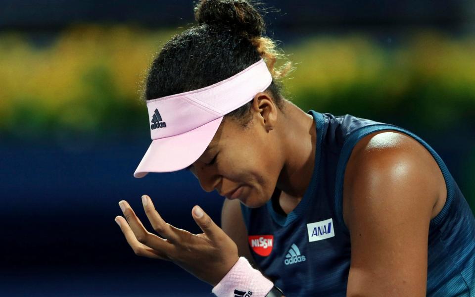 Naomi Osaka has spoken candidly about the challenge of being in the spotlight - AP